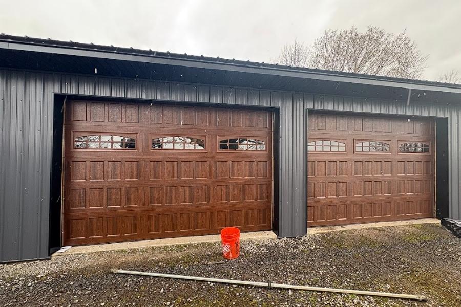 When a garage door starts acting differently in Canandaigua, it usually does not happen out of nowhere. It shows up as a door that sticks after a cold snap, struggles to close evenly, or starts making more noise than it used to.